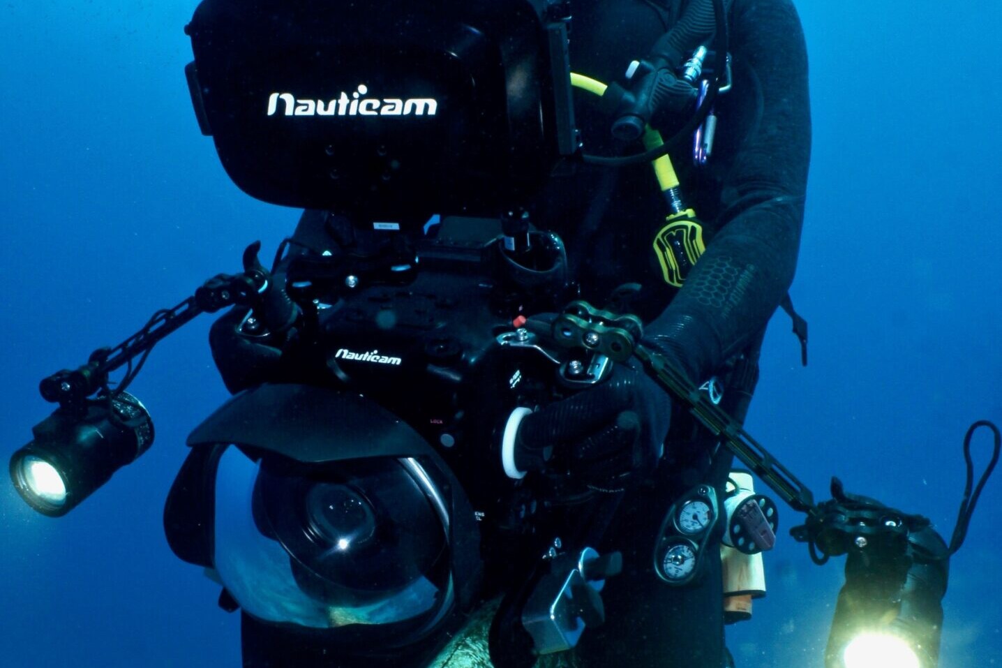 Underwater Cinematographer with camera rig
